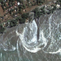 the name of god written by tsunami huge waves